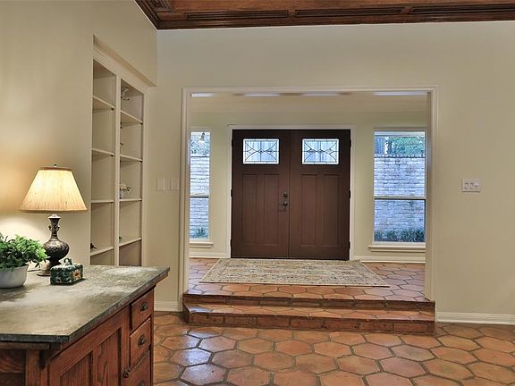 Beautiful double doors set the tone in the entrance.