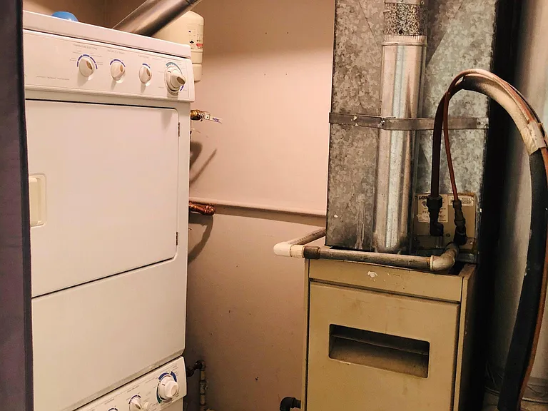 Utilities room - Washer, Dryer, heating furnace and water heater