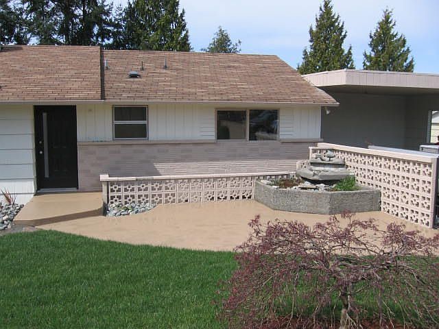 Beautiful Low Maintenance Front Yard with Waterfall
