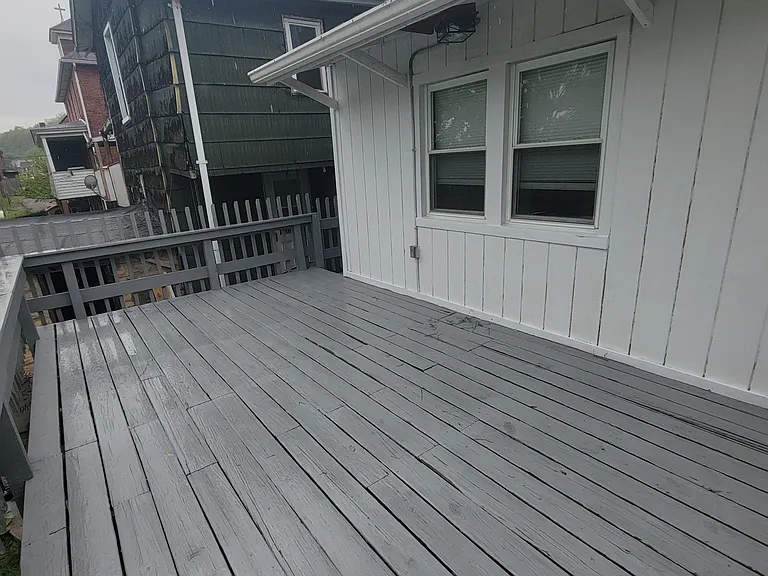 back deck with access from kitchen and yard