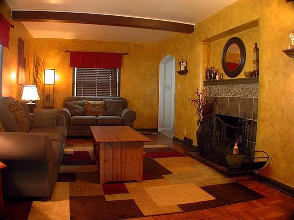 Living Room w/ wood burning fireplace