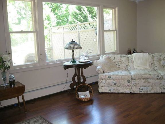 Living room picture window to view the outdoor gardens