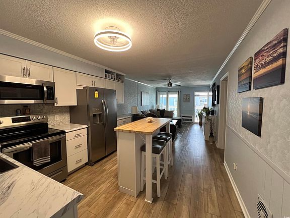 2nd image of 9530 Shore Dr. #3C