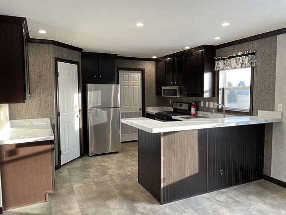 2nd image of 7204 E Grand River Ave Lot 377