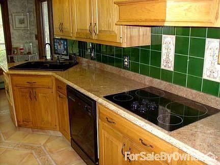 Kitchen
						:
						Wood-Mode oak cabinets with plenty of storage. Dome-It lighted ceiling.