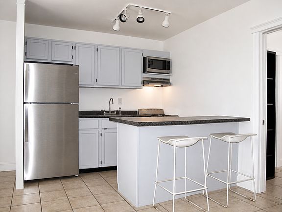 Kitchen & bar counter, view from living room area