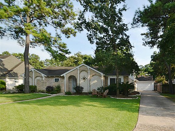Oversized 2 car detached garage with long driveway. Double Paned Windows.
