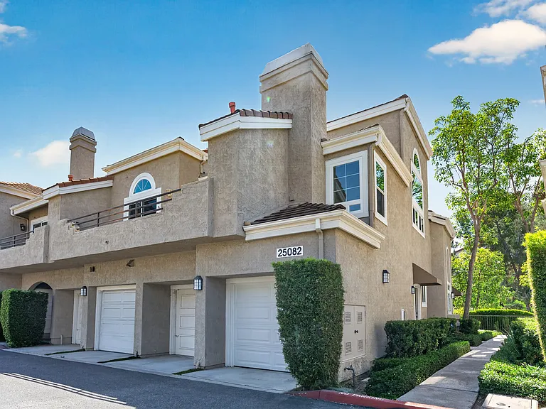 END UNIT WITH BRAND NEW WINDOWS & ONE CAR ATTACHED GARAGE WITH DIRECT ACCESS TO HOME