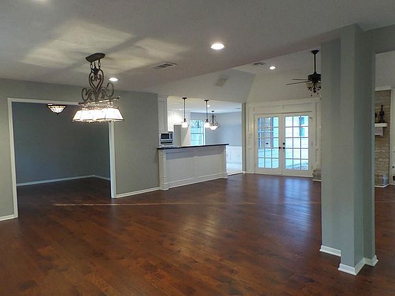 Open concept versatile plan with study and formal dining or game room