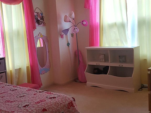 Bedroom w/ plenty space for long dresser, bookcase, dv