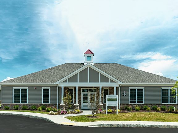 Our clubhouse is the perfect place to relax and socialize, featuring a kitchen area, a welcoming fireplace, a comfortable lounge space, and more!