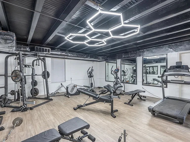 Experience a well-equipped modern gym designed for optimal workouts.