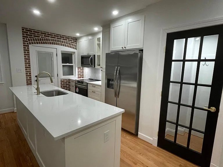 Refrigerator with ice and water dispenser.