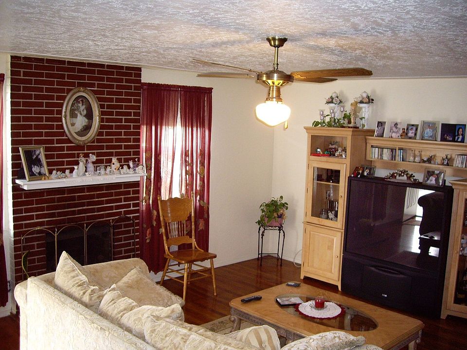 living room w/brick fire place