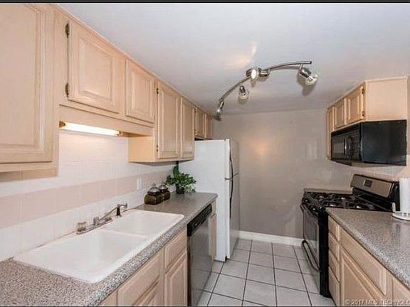 kitchen with open pass thru to dining area