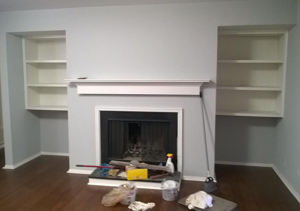 Wood burning fireplace with built in shelving