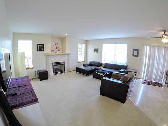 Family room connects to kitchen and backyard. Gas fireplace and plenty of windows make this room warm and inviting!