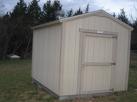 back building. back of building area where the trees are, is part of the property.
