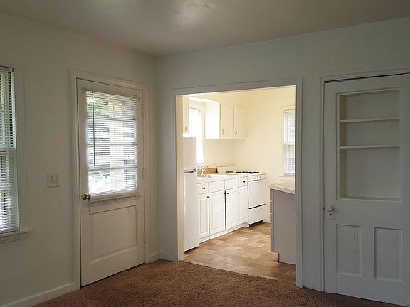 Living room looking into kitchen