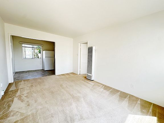 Lots of natural lighting throughout, new carpets and wall-mounted heater!