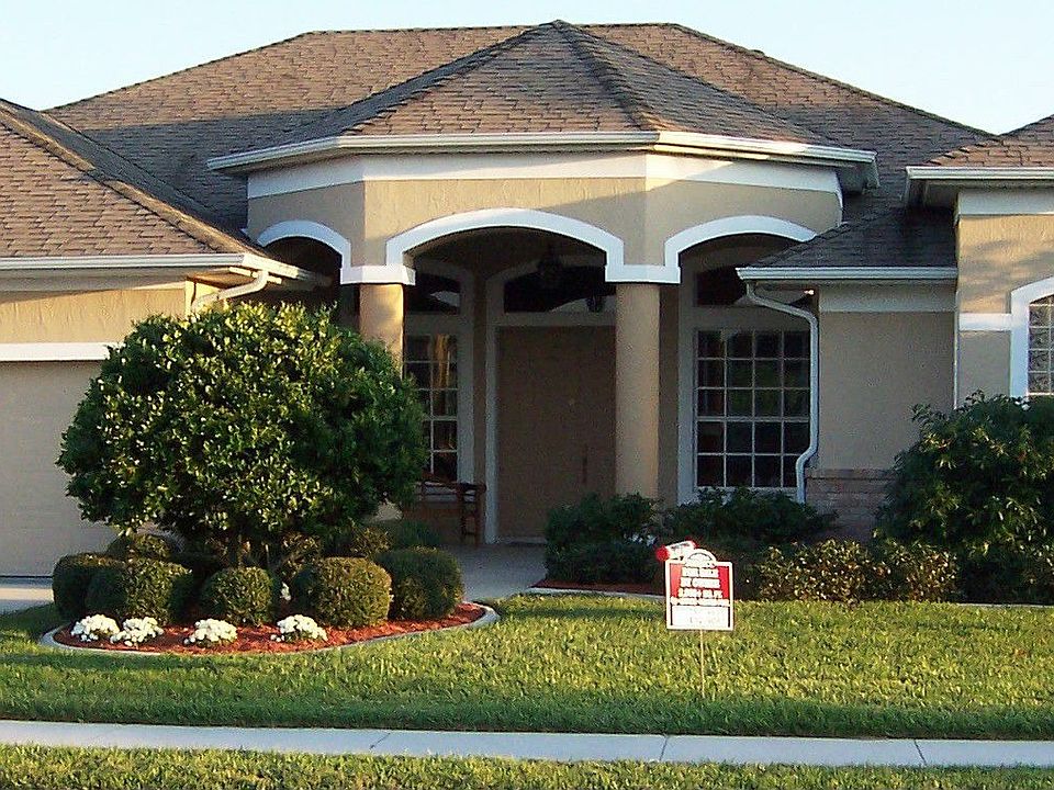 CBS w/brick accents, large front entryway features double doors, 3 car garage