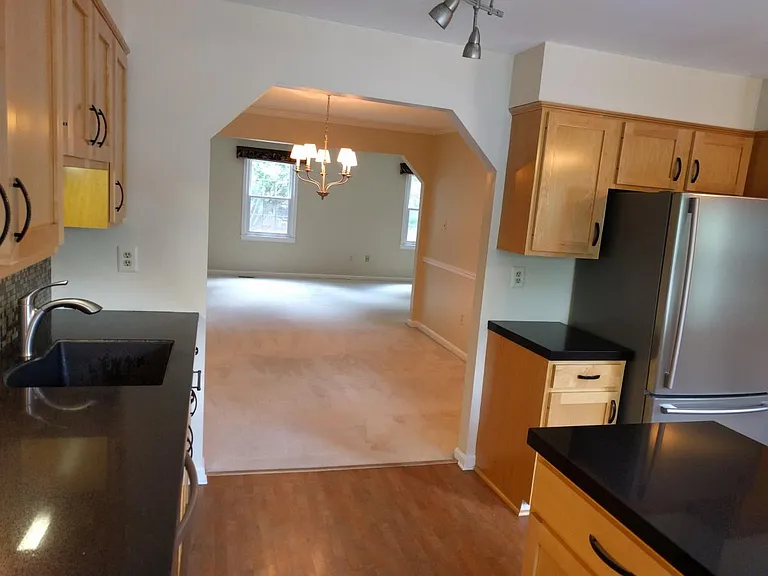 From kitchen through dinning room to living room