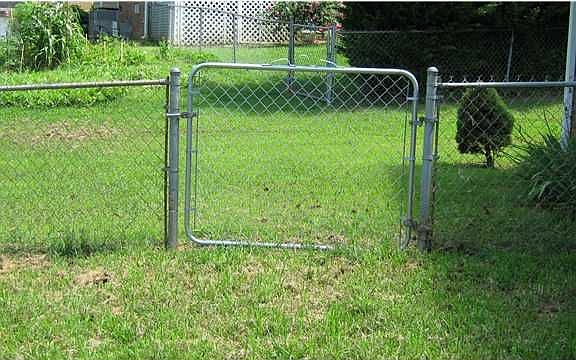 LARGE FENCED IN BACKYARD