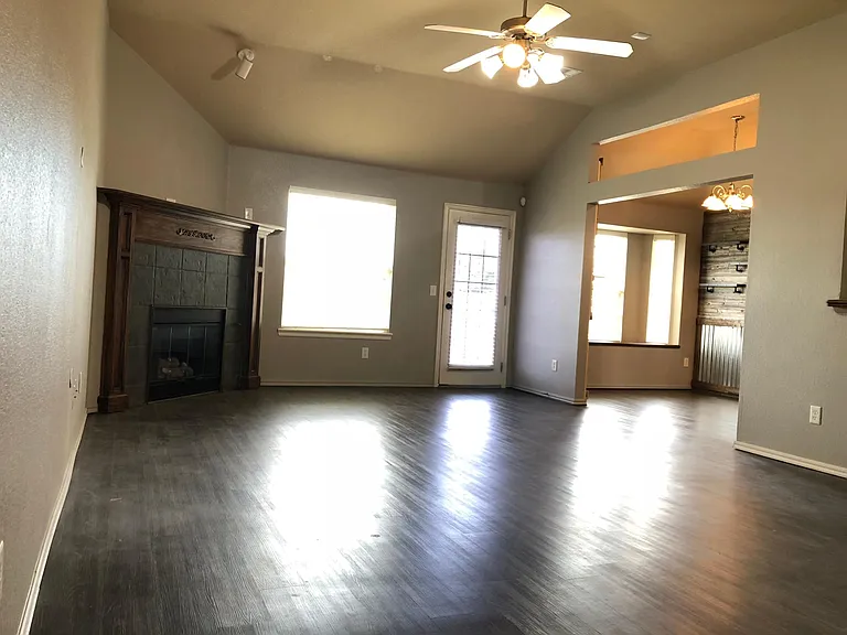 Large living room with gas fireplace.