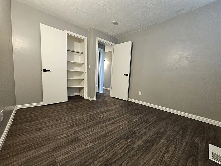 Bedroom 1 with closet view