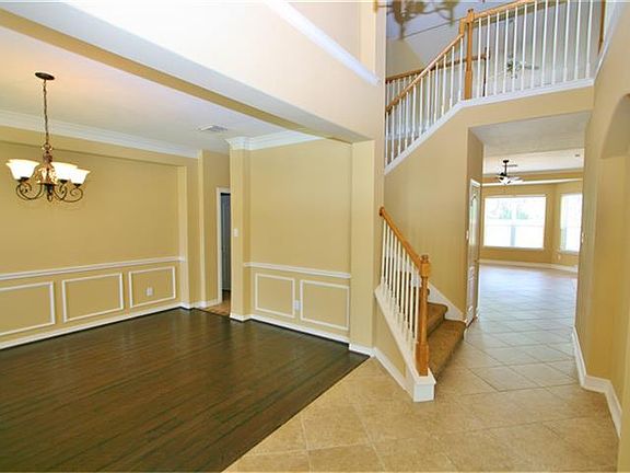 The minute you walk through the door, you are drawn in by the enticing blues of the pool through the living room windows.