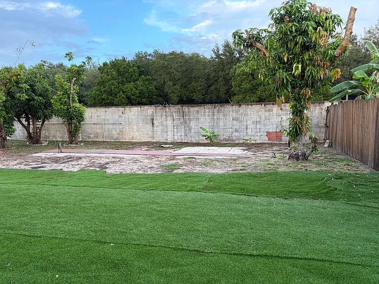 Fully enclosed, fenced in backyard