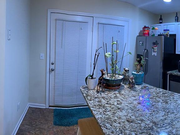 Panoramic view of kitchen, laundry room, pantry