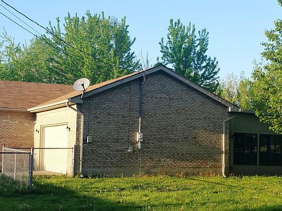 Exterior rear - excuse the dandelions!