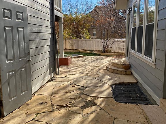 Flagstone patio in the back yard.