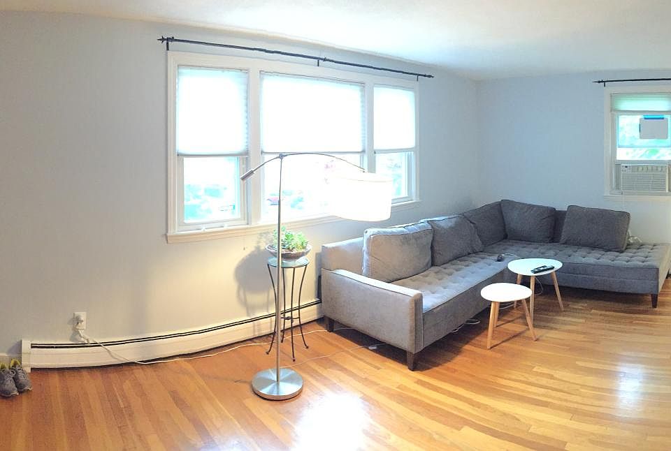 Huge living room with plenty of natural light.