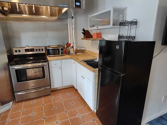 Kitchen with professional fume hood