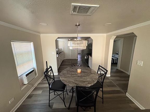 Dining & Kitchen view from Living Room area.