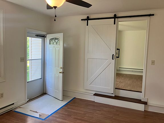 living room front door - steps to bedroom