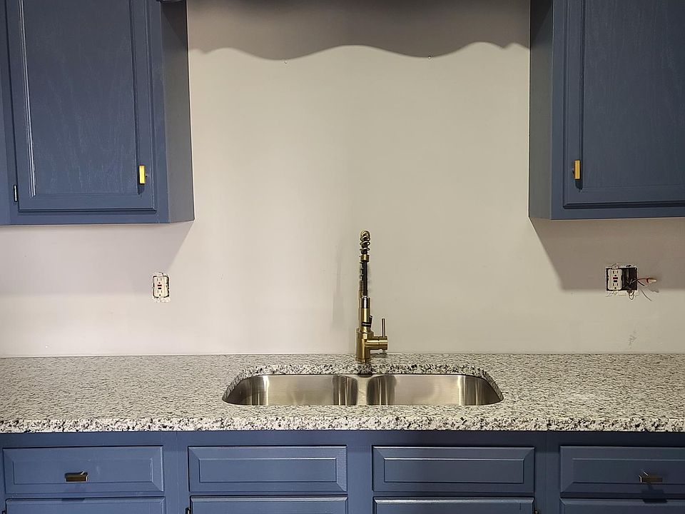 Brand new granite counters, sink, and fixtures