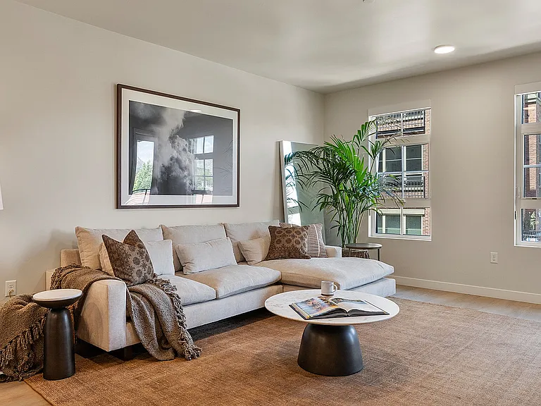 Living room with open layout in Jade model