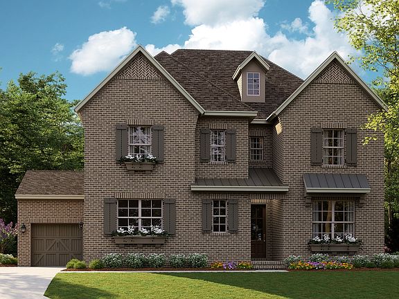 Hermosa B - English Cottage 3-Car Side Load Garage Note Renderings may show optional features