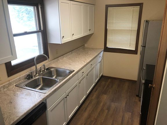 Nice Alley Kitchen with great windows and Fridge, Stove, Dishwasher