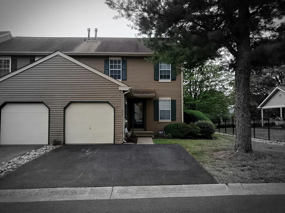 Front of home with double driveway