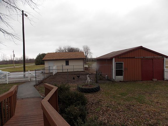 metal shed and two 1/2 car g