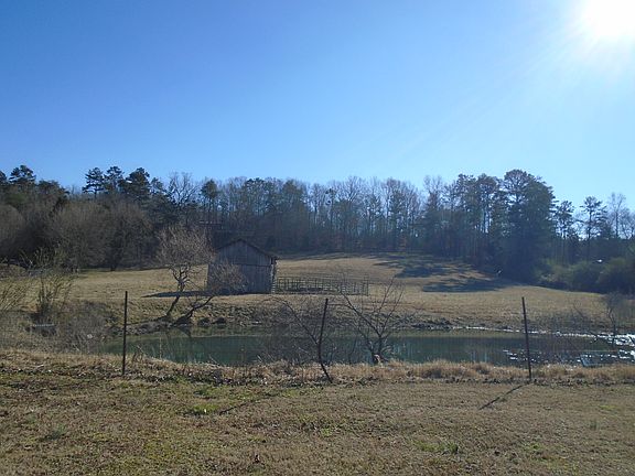 pond with barn