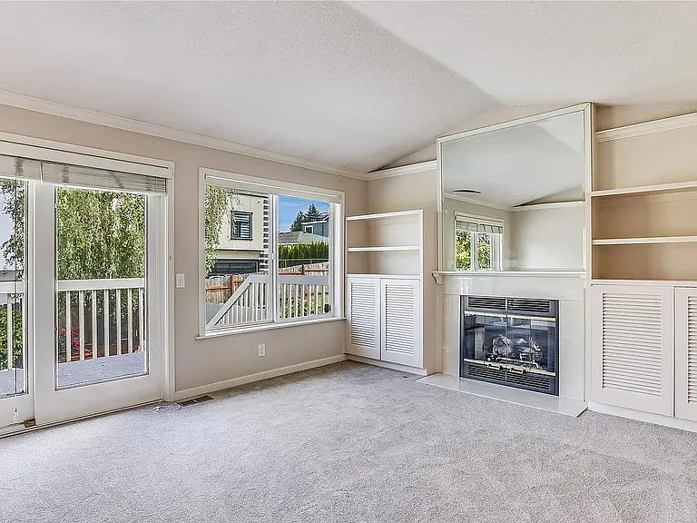 living room connecting to backyard deck