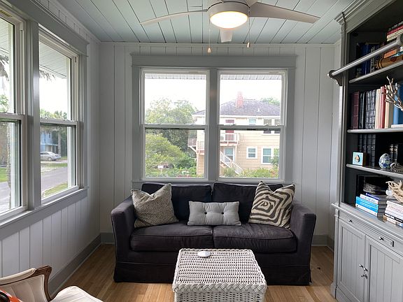 Sitting area on front/2nd Steet side (east facing sunporch)