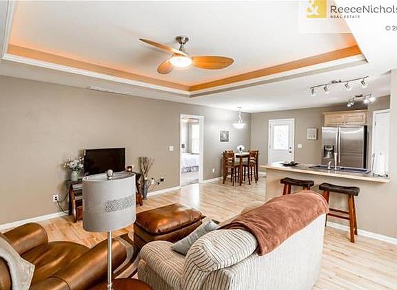 Wonderful open floor plan makes this already spacious  living area feel huge!