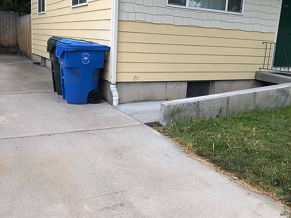 Side view showing basement entrance