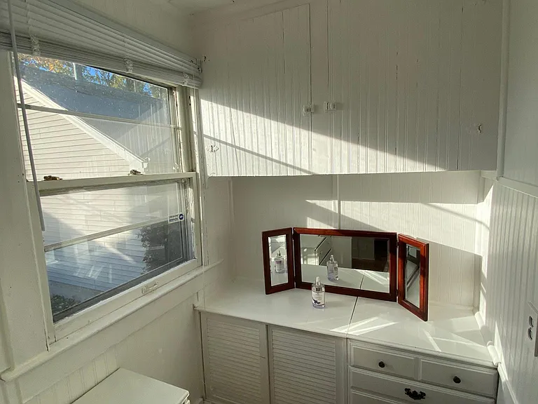 The window in the walk-in closet in the Third bedroom provides ample light.